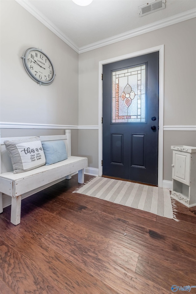 1045 Cove Rd, Southside, AL 35907 - foyer entrance with crown molding, visible vents, baseboards, and wood finished floors