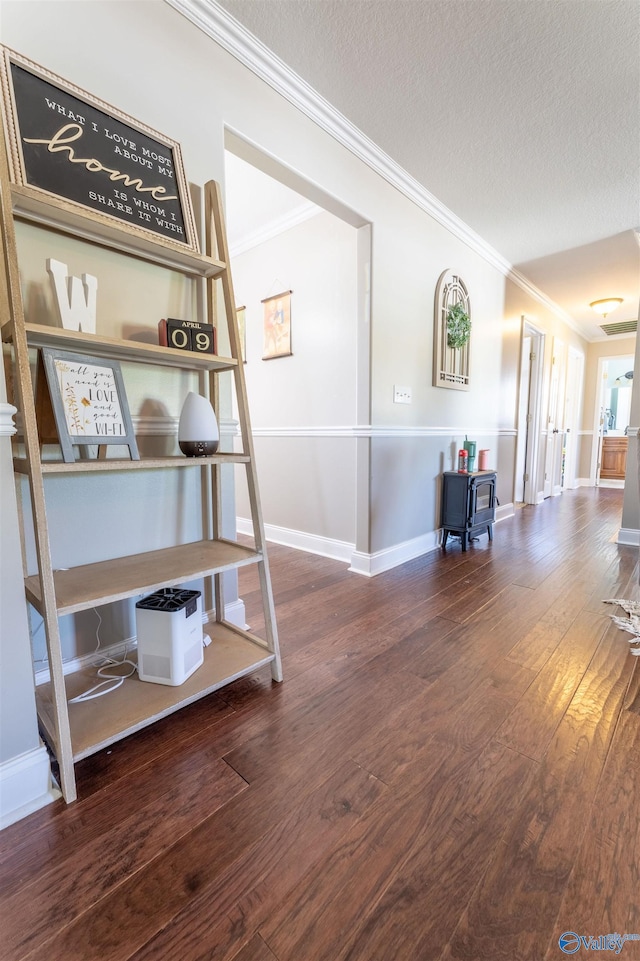 1045 Cove Rd, Southside, AL 35907 - hall featuring crown molding, baseboards, hardwood / wood-style flooring, and a textured ceiling