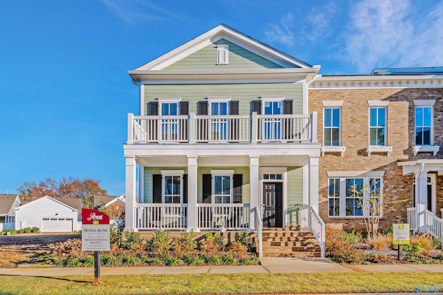 view of front of house with a balcony