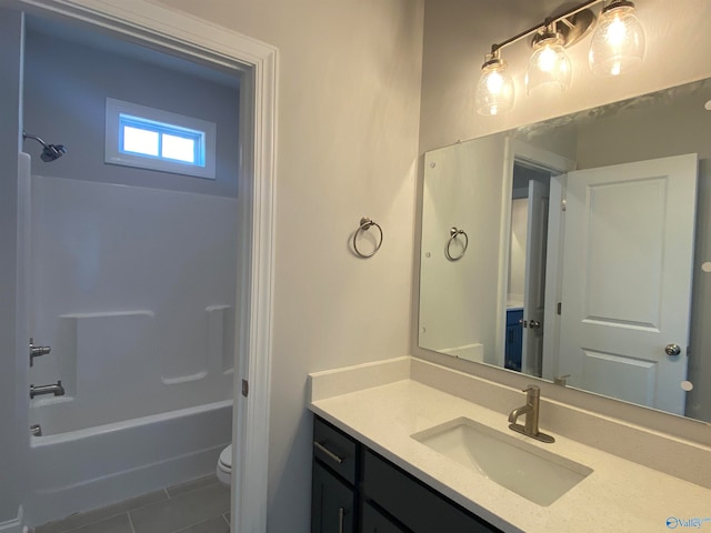 full bathroom featuring vanity, tile patterned floors, shower / bathtub combination, and toilet