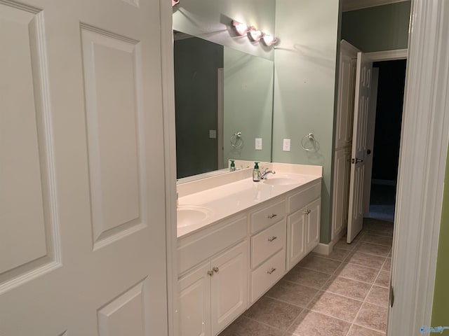 bathroom with tile patterned flooring and vanity