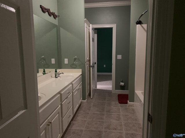 bathroom featuring tile patterned flooring, vanity, and ornamental molding