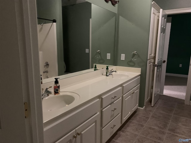 bathroom with vanity and shower / bath combination