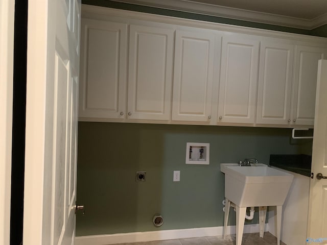 laundry area featuring cabinets, hookup for an electric dryer, hookup for a washing machine, light tile patterned floors, and ornamental molding