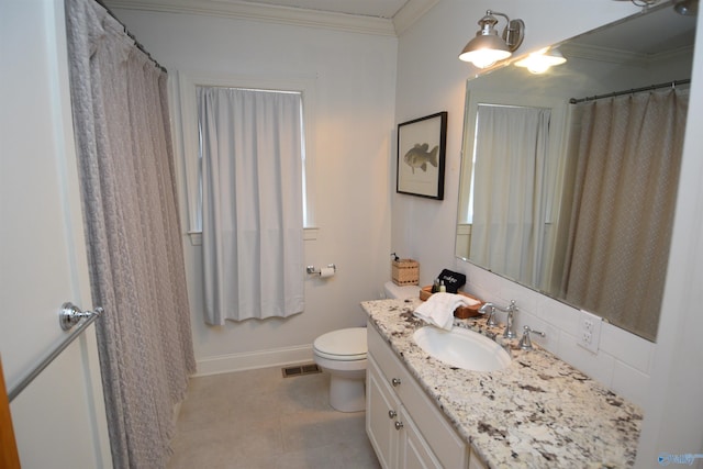 bathroom featuring crown molding, vanity, toilet, and tasteful backsplash