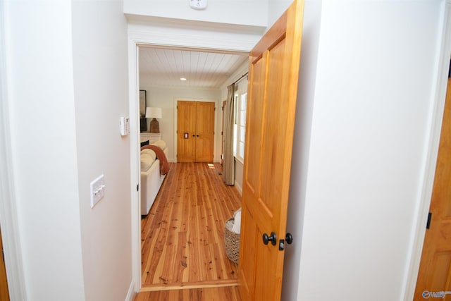 corridor featuring light hardwood / wood-style floors