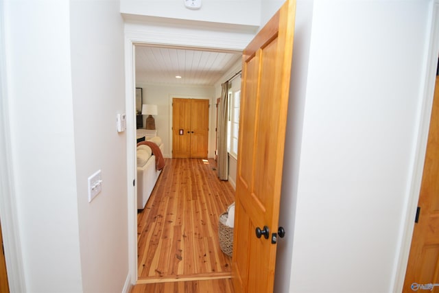 hallway with light wood finished floors