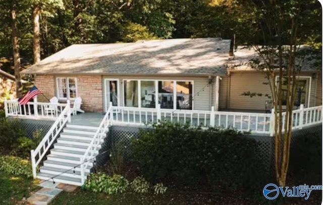 view of front of house featuring a deck