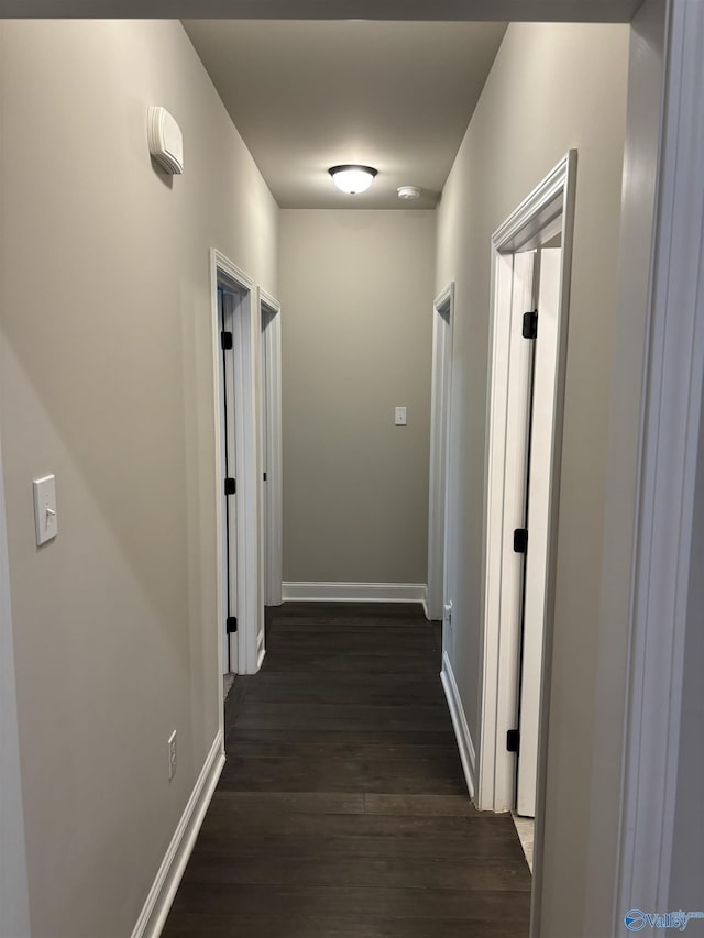 12794 Hudbug Dr, Madison, AL 35756 - hall with dark wood-type flooring and baseboards