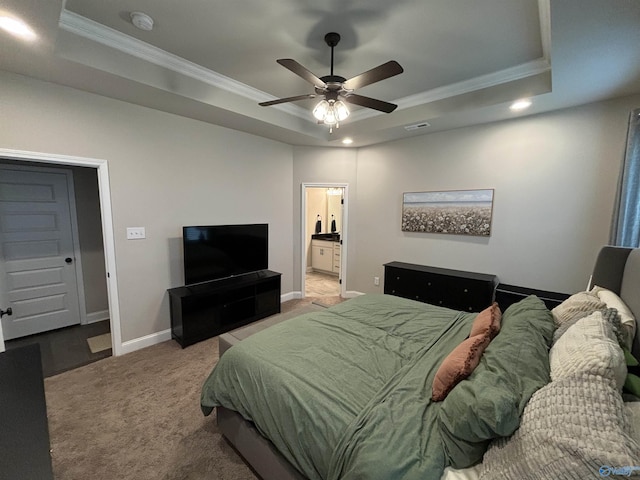 12794 Hudbug Dr, Madison, AL 35756 - carpeted bedroom featuring a raised ceiling, crown molding, baseboards, recessed lighting, and ensuite bathroom