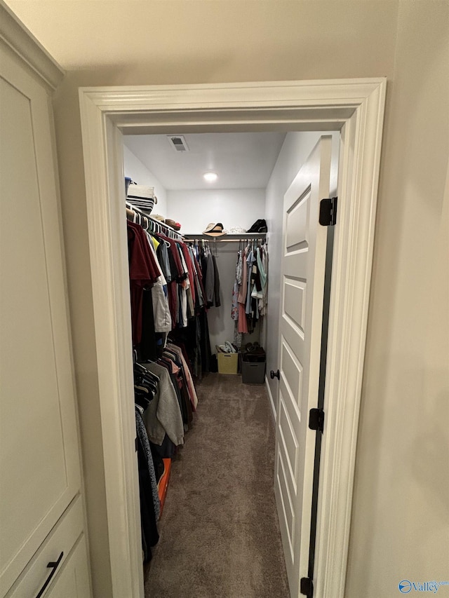 12794 Hudbug Dr, Madison, AL 35756 - walk in closet featuring dark carpet