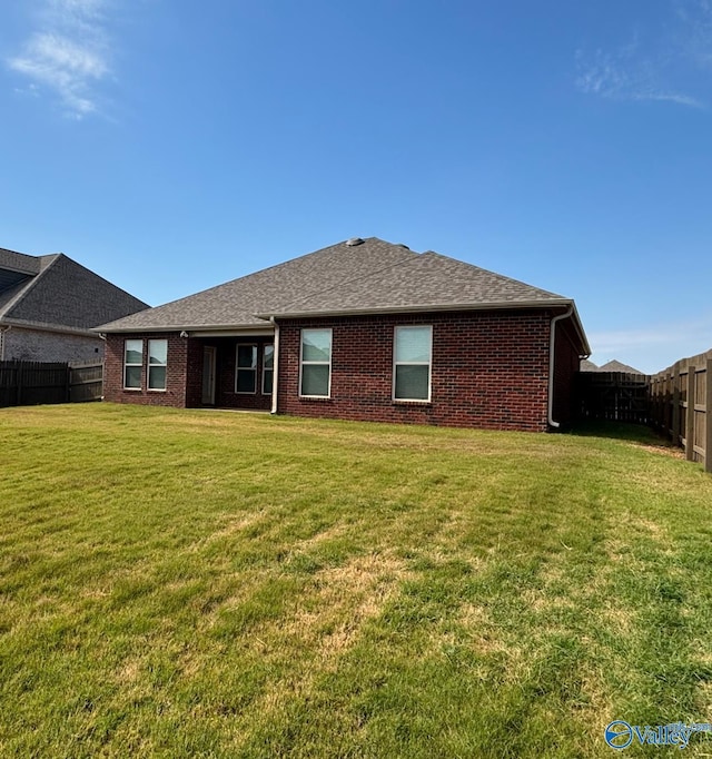 12794 Hudbug Dr, Madison, AL 35756 - back of property with brick siding and roof with shingles