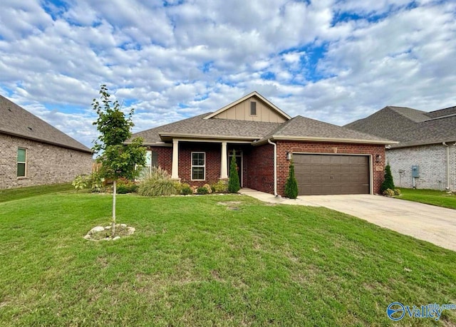 12794 Hudbug Dr, Madison, AL 35756 - craftsman inspired home with a garage, concrete driveway, a front yard, brick siding, and board and batten siding
