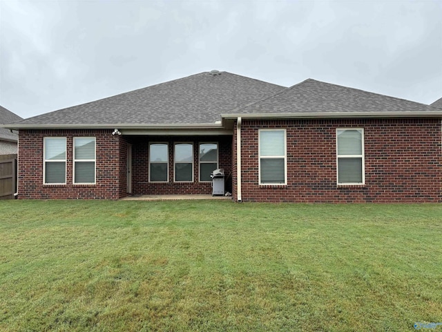 12794 Hudbug Dr, Madison, AL 35756 - back of property featuring roof with shingles and brick siding