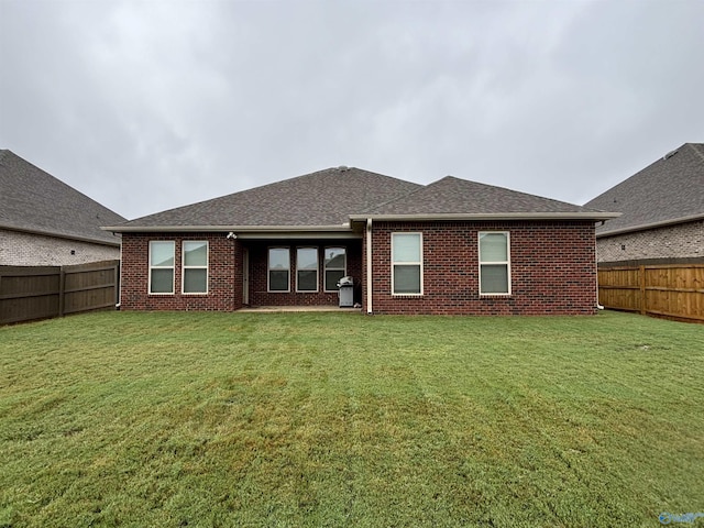 12794 Hudbug Dr, Madison, AL 35756 - rear view of property featuring brick siding and a shingled roof