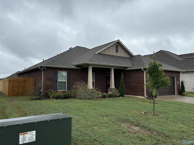 12794 Hudbug Dr, Madison, AL 35756 - view of front of house featuring an attached garage, brick siding, board and batten siding, driveway, and roof with shingles