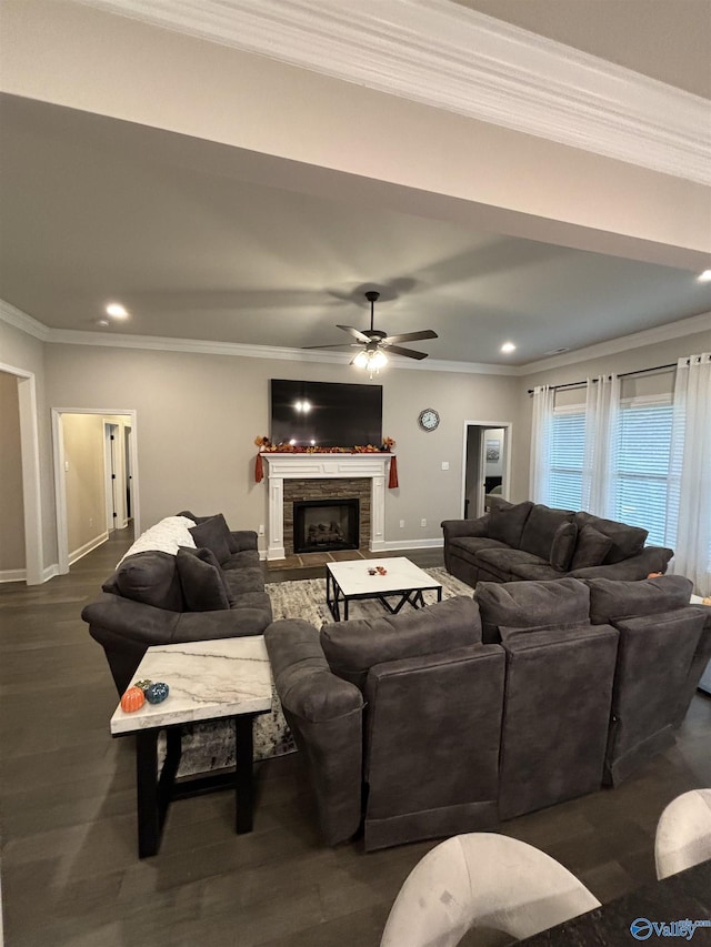 12794 Hudbug Dr, Madison, AL 35756 - living room with baseboards, ornamental molding, a stone fireplace, a ceiling fan, and recessed lighting