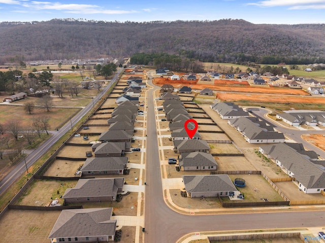 birds eye view of property with a residential view