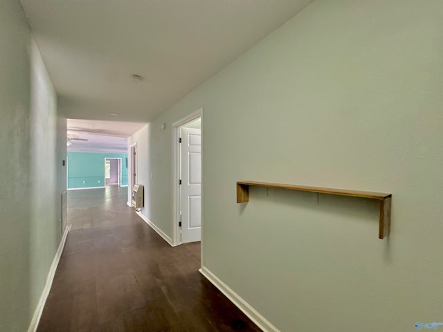 corridor featuring dark wood-type flooring