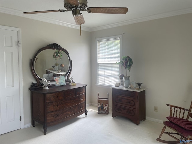 16052 Court St, Moulton, AL 35650 - living area featuring light carpet, a ceiling fan, crown molding, and baseboards