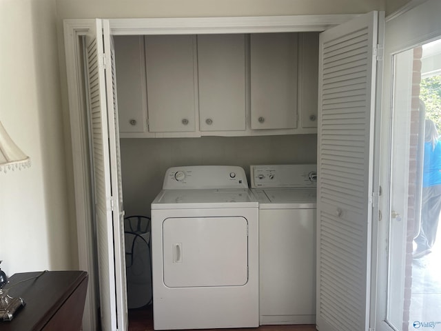 16052 Court St, Moulton, AL 35650 - washroom featuring separate washer and dryer and cabinet space