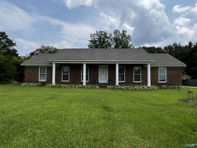16052 Court St, Moulton, AL 35650 - ranch-style house with a front yard, brick siding, and roof with shingles