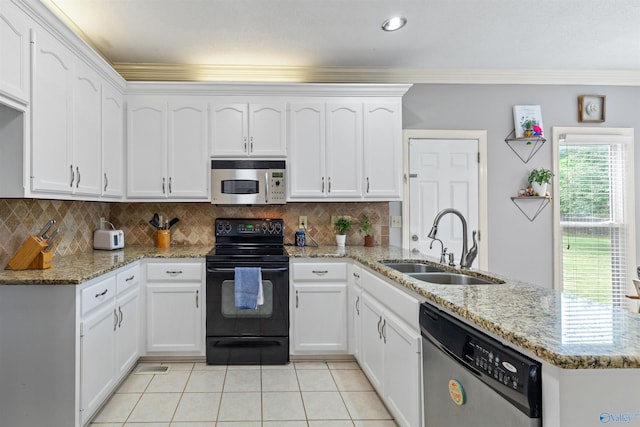 kitchen with a sink, stainless steel appliances, light tile patterned floors, a peninsula, and ornamental molding
