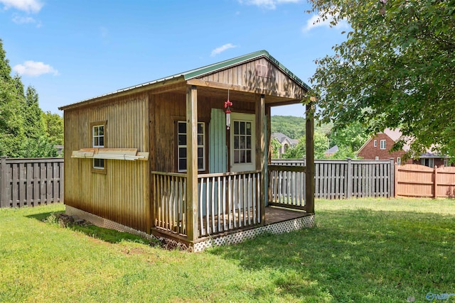 view of outbuilding with a fenced backyard