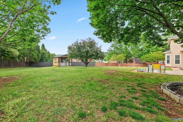 view of yard with a fenced backyard and a patio area
