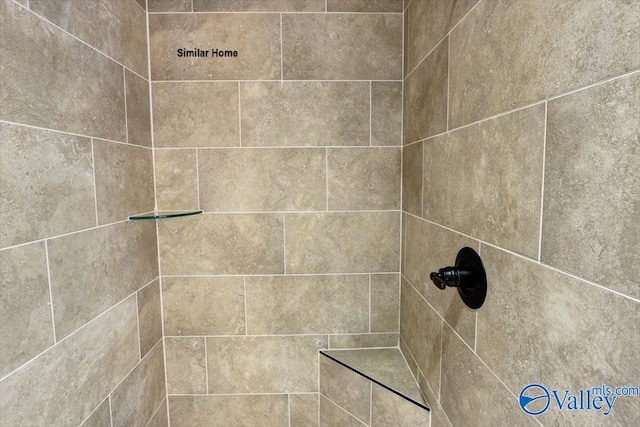 details with a tile shower