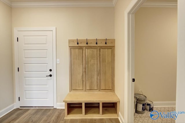 mudroom with hardwood / wood-style flooring and ornamental molding