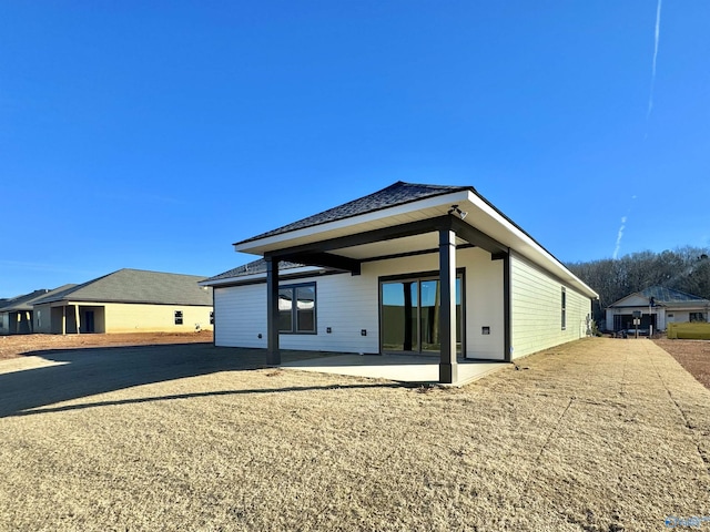 rear view of property with a patio