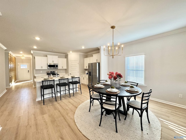 dining room with crown molding, a chandelier, light wood-type flooring, recessed lighting, and baseboards