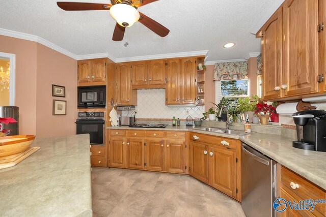 kitchen with black appliances, ceiling fan, decorative backsplash, ornamental molding, and sink