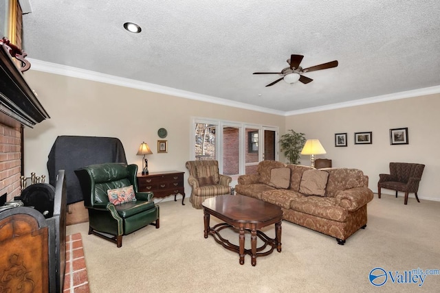 living room featuring a fireplace, crown molding, light carpet, and ceiling fan