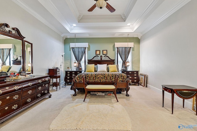 carpeted bedroom featuring multiple windows, ceiling fan, a raised ceiling, and crown molding