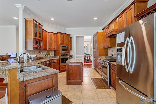 kitchen with light stone countertops, stainless steel appliances, ornamental molding, sink, and kitchen peninsula