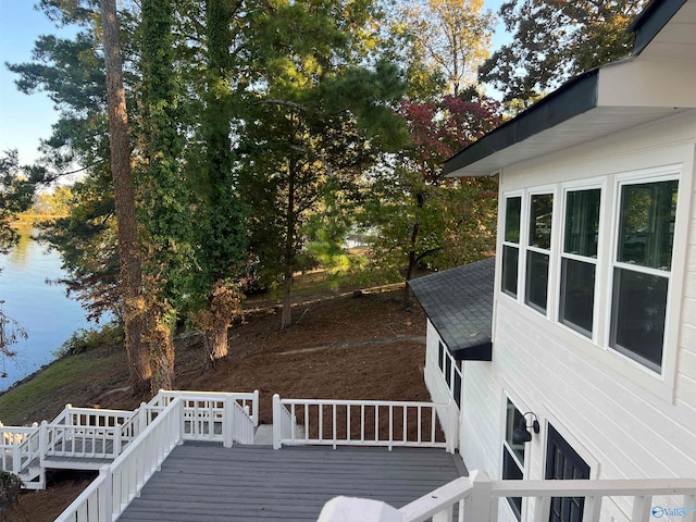 deck featuring a water view