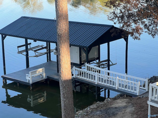 dock area with a water view