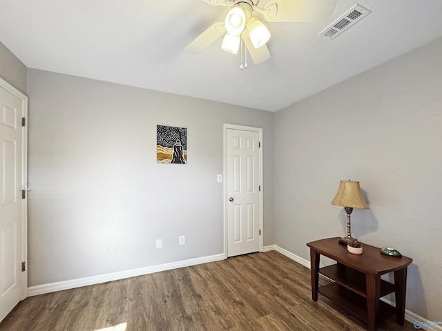 interior space featuring ceiling fan and wood-type flooring