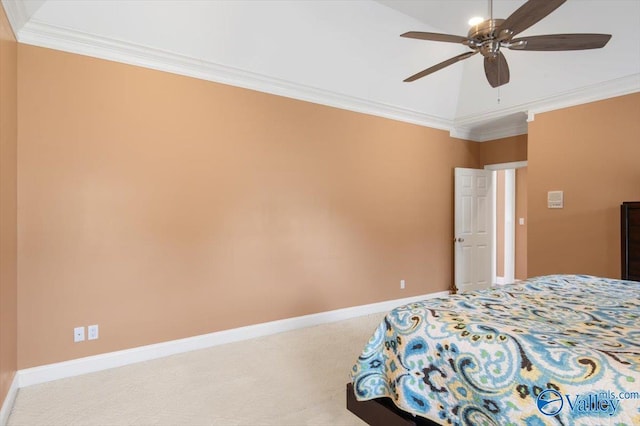 bedroom with vaulted ceiling, ornamental molding, carpet floors, baseboards, and ceiling fan