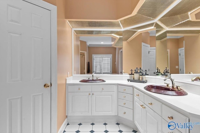 bathroom with a sink and double vanity