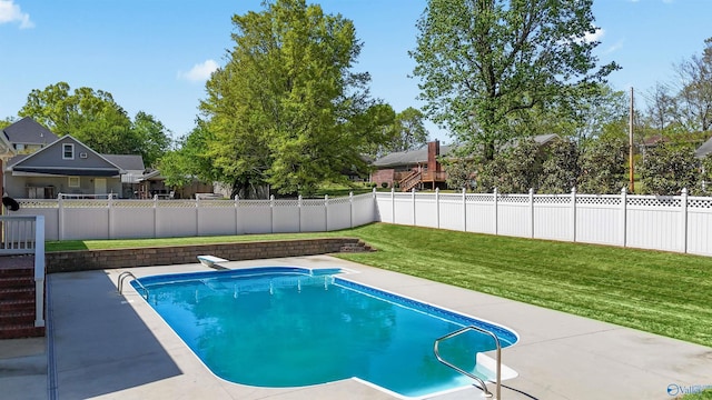 view of pool with a fenced in pool, a lawn, and a fenced backyard