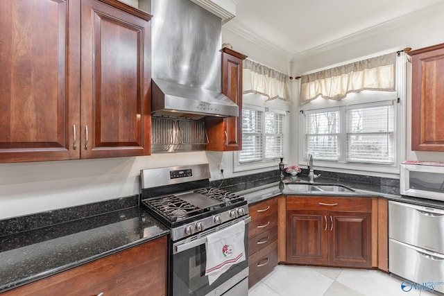 kitchen featuring sink, wall chimney range hood, dark stone countertops, stainless steel range with gas stovetop, and ornamental molding