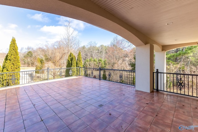 view of patio with a balcony