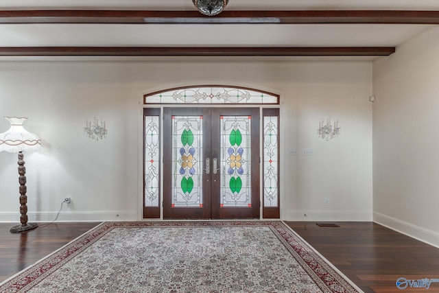 foyer with french doors, dark hardwood / wood-style floors, and beam ceiling