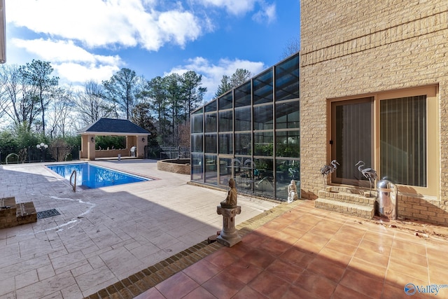 view of pool with a gazebo and a patio area