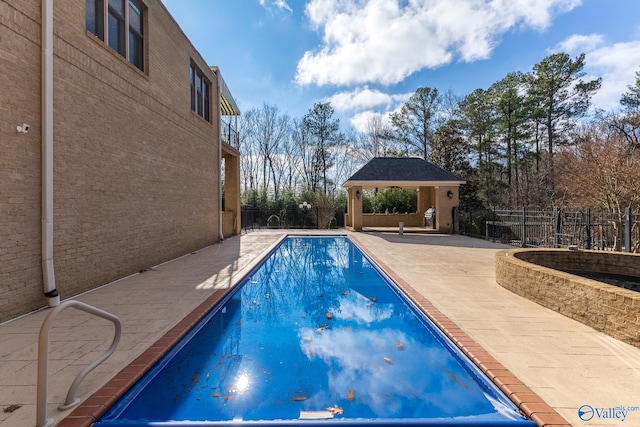 view of pool with a gazebo and a patio