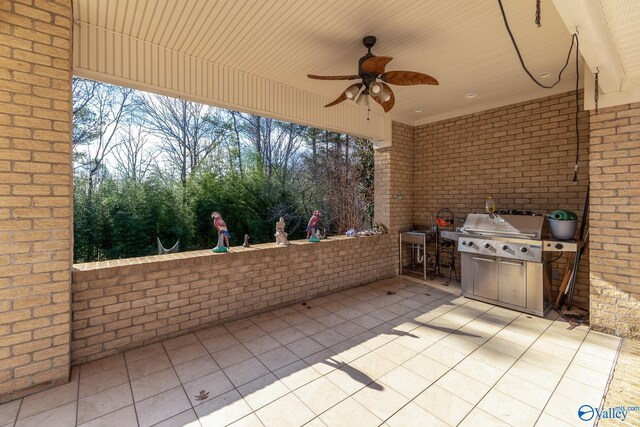 view of patio with ceiling fan and a grill