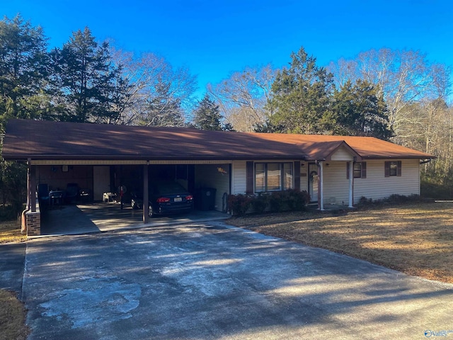 ranch-style home featuring a carport